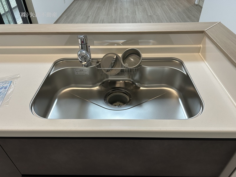 �V���N